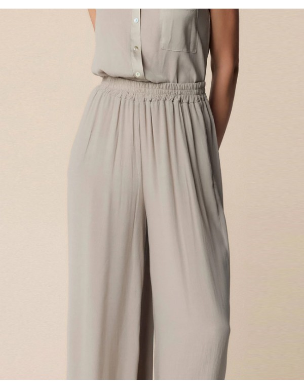 KoccaFlowing grey trousers with pleated waist detailing