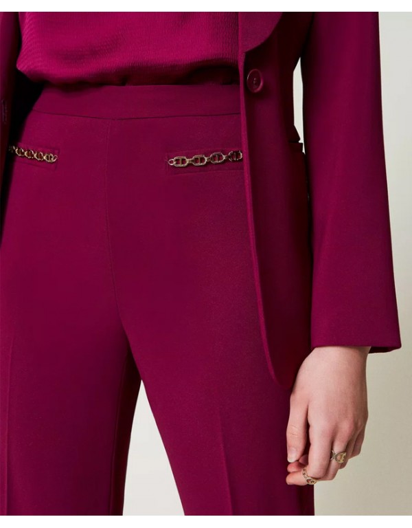 Flared trousers with Oval T chain